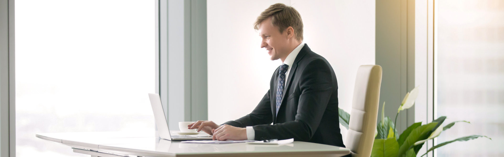 Man busy working on a laptop.